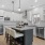 Bright and open kitchen with island in townhomes at The Preserve at Stone Gate