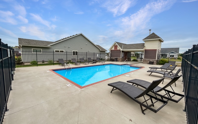 Outdoor community pool at The Preserve at Stone Gate
